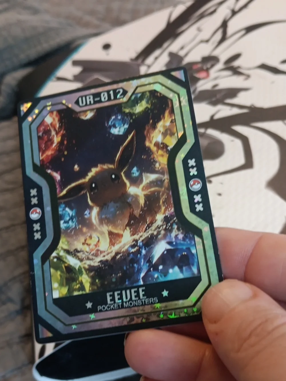Pokemon Eevee Holographic Card - Brown, Black, Blue Accents